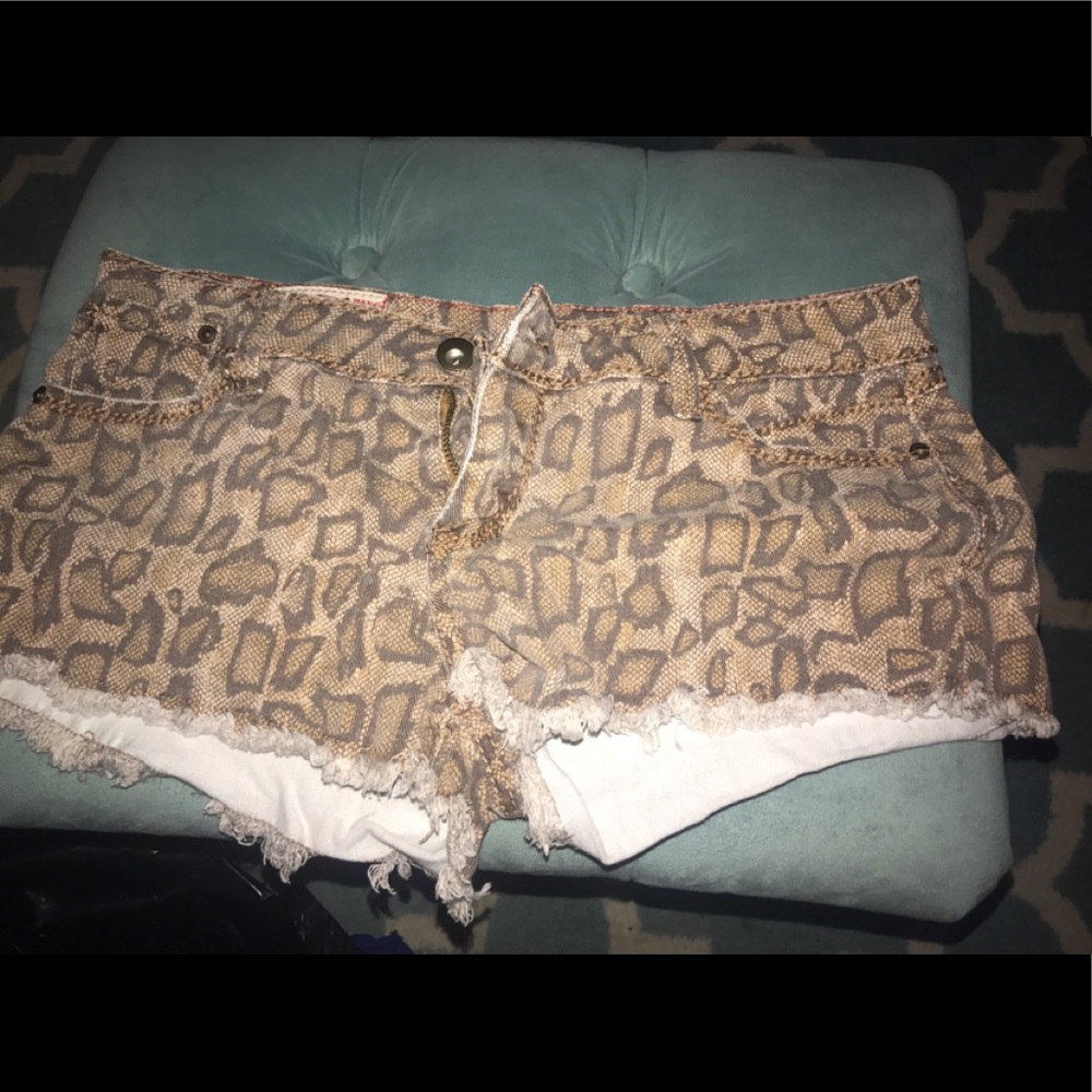Woman’s cheetah shorts size 11
